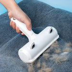 Duck-design pet hair brush self-cleaning chamber open showing collected fur